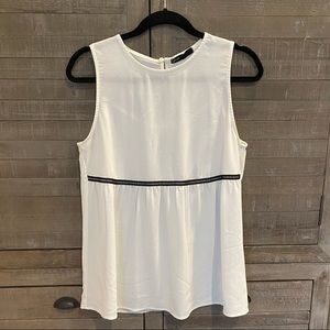 Sheer white Gibson tank with black accents